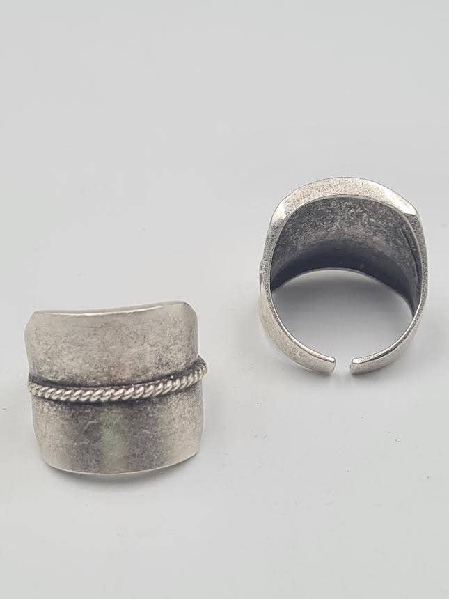 Wide band twisted edge statement Ring