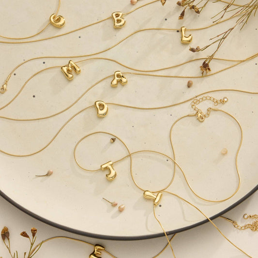 16 Assorted 18K Gold Dipped Bubble Initial Necklace: Gold / One / 5DN18102
