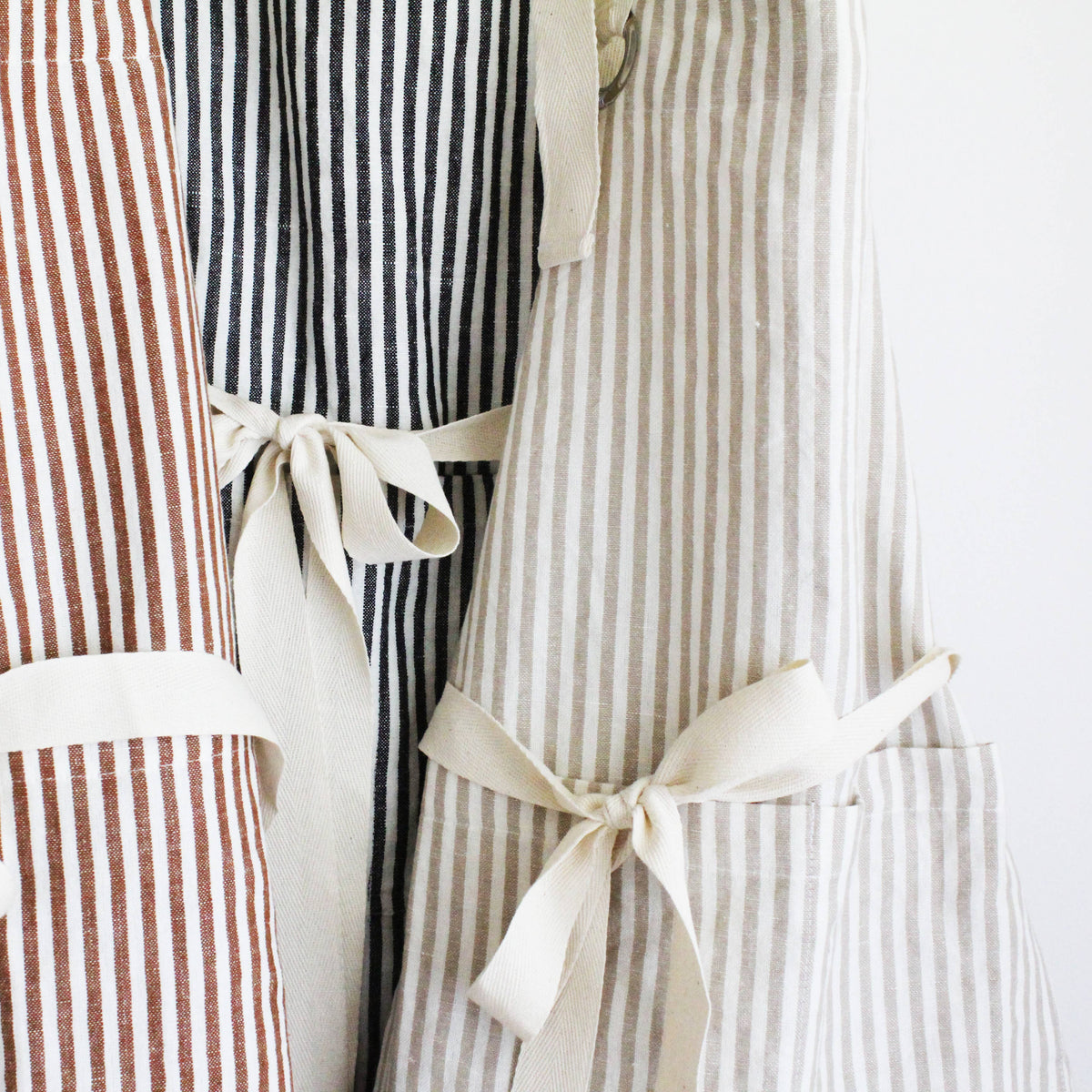 Ruffle Pin Stripe Apron: Tan
