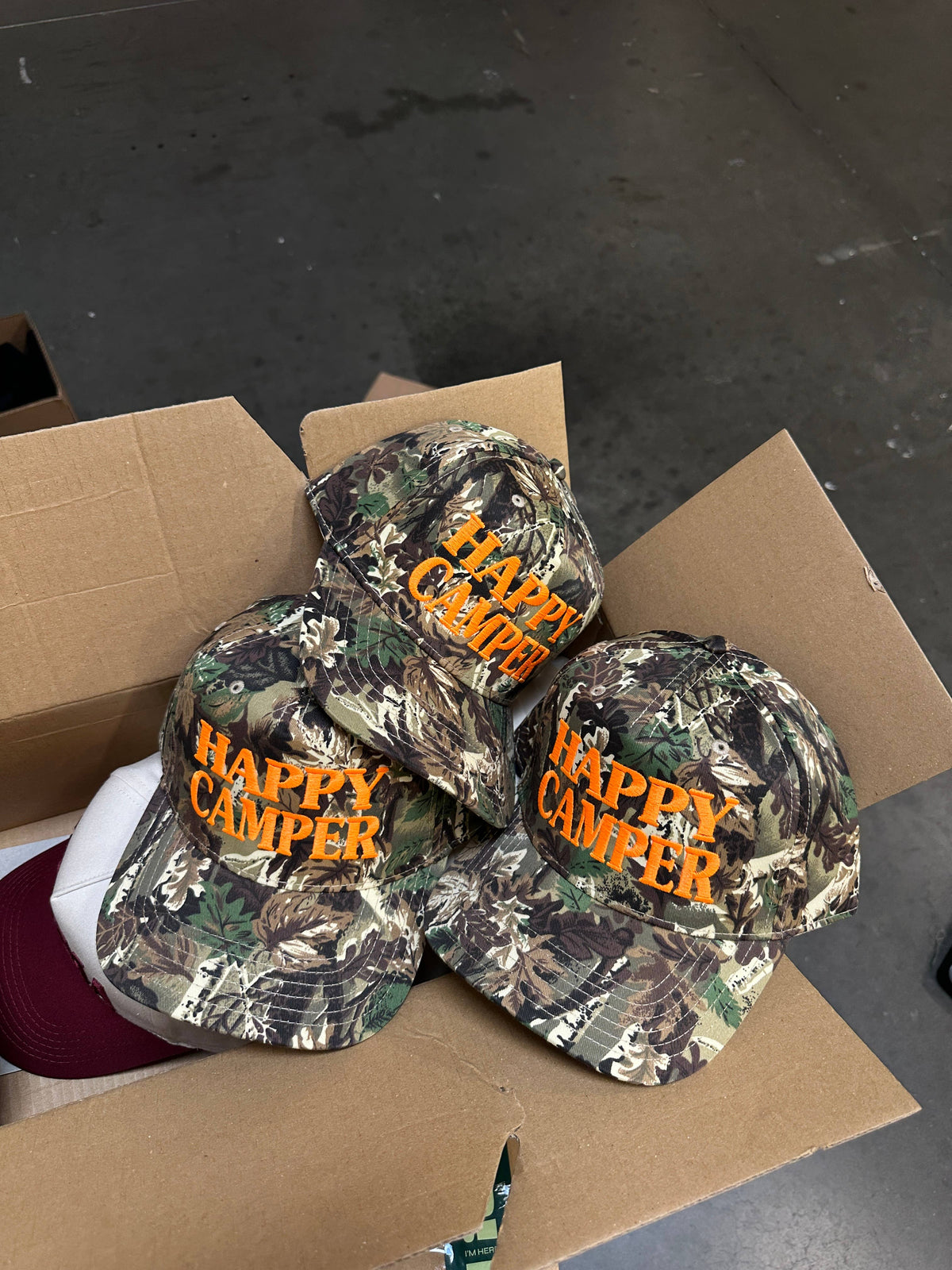 Happy Camper Camo hat: Neon orange